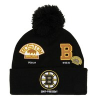 Men's Mitchell & Ness Black/ Boston Bruins 100th Anniversary Collection Timeline Cuffed Knit Hat with Pom